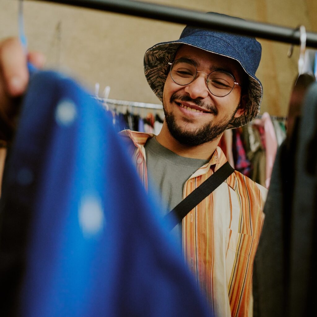Man looking at clothes